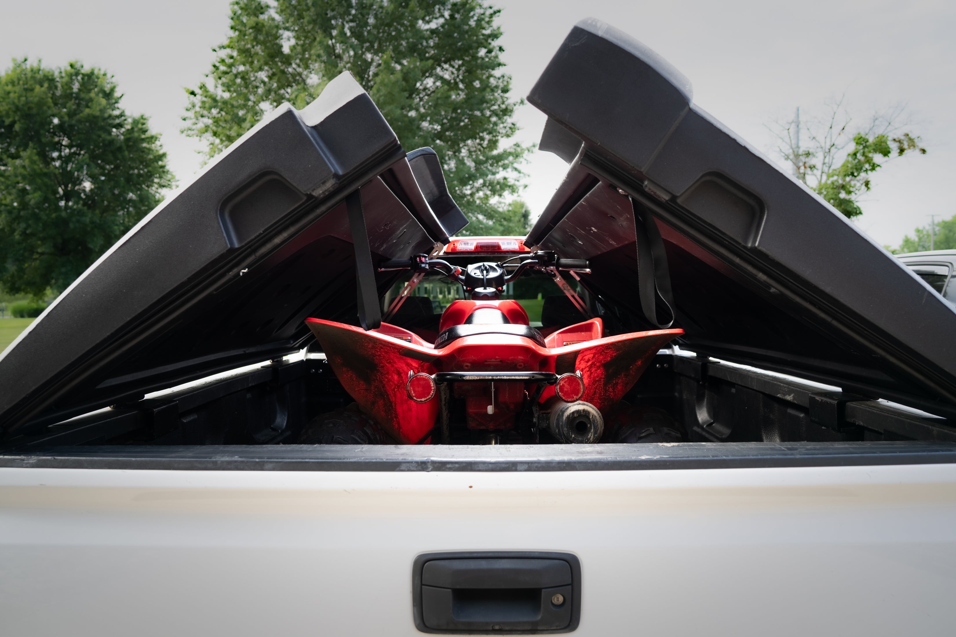 FastBack cover open while hauling an ATV